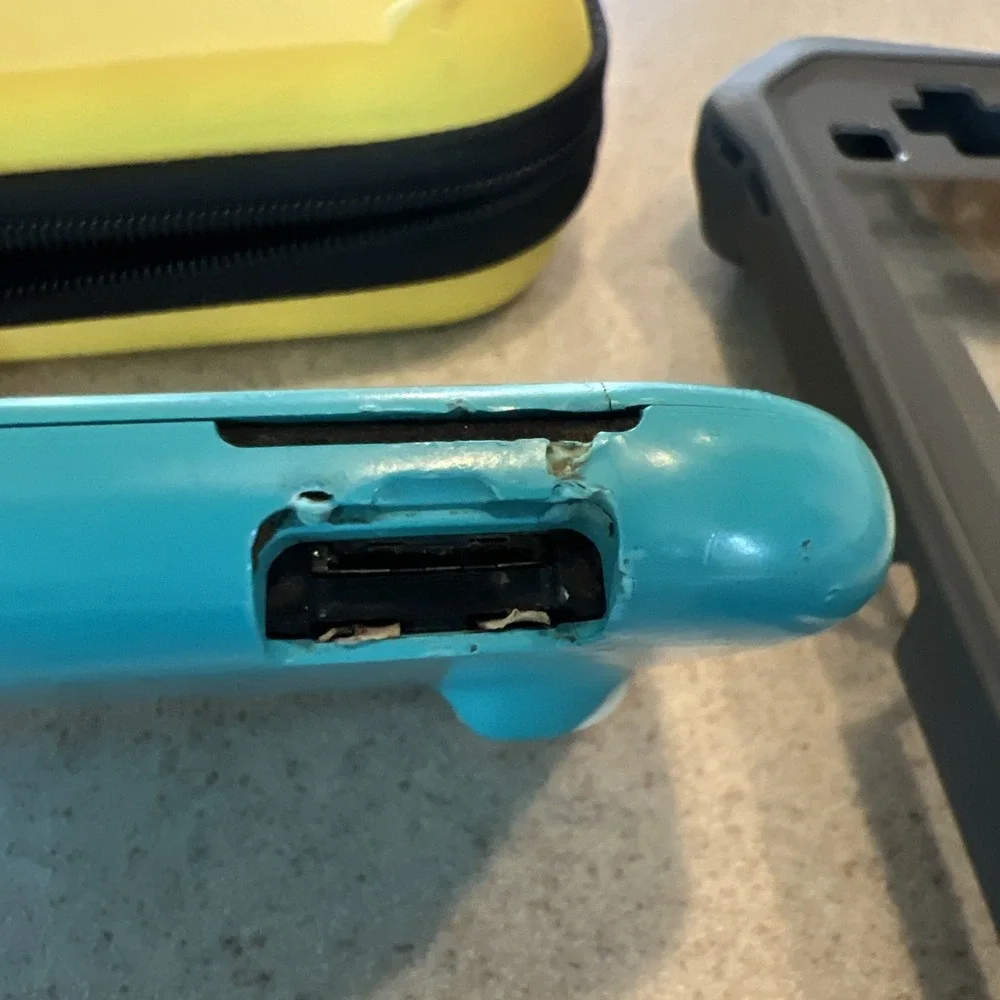 Nintendo Switch Lite Handheld Teal with Pikachu Case One Game And Console Case